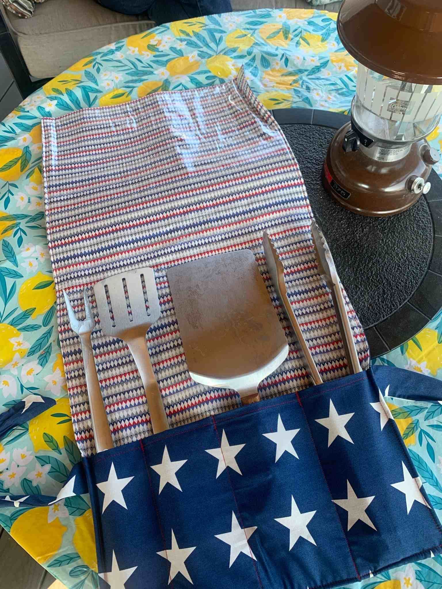 A wooden utensil set is sitting on top of a table