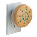 A wooden cookie is sitting on top of a white electrical outlet.