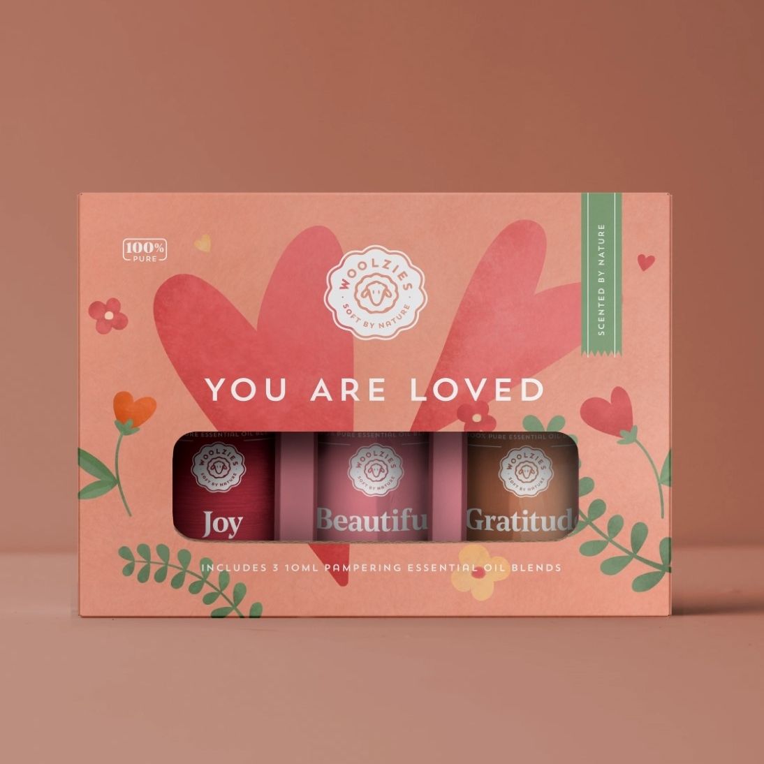 A box that says ' you are loved ' on it