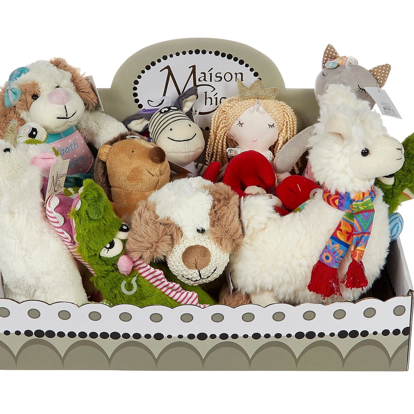 A box filled with stuffed animals and a sign that says maison