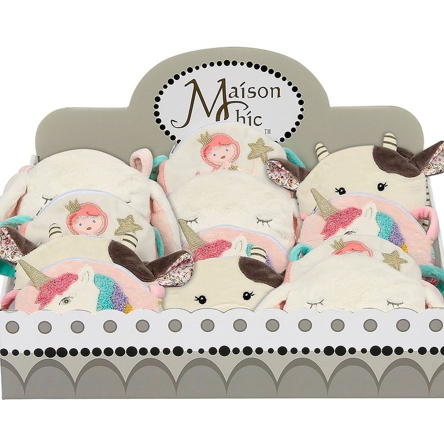 A box filled with stuffed animals including a unicorn and a mermaid.