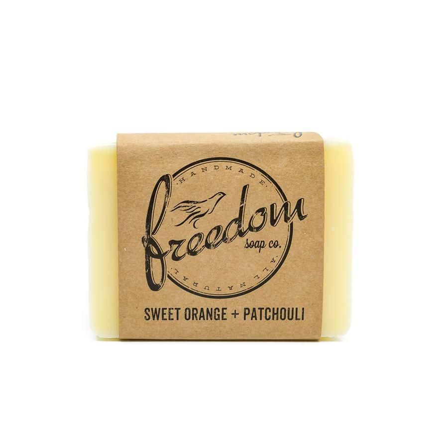 A bar of soap with the words `` sweet orange patchouli '' on it.