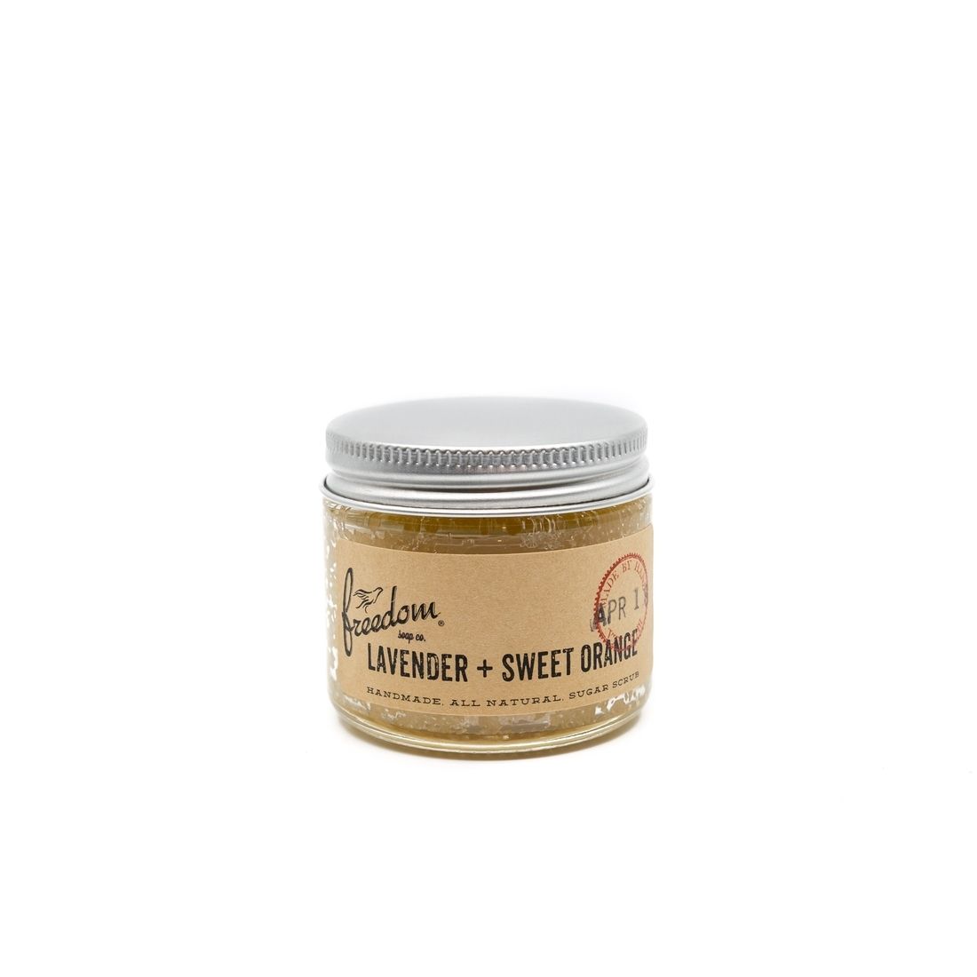 A small jar of lavender and sweet orange soap on a white background.