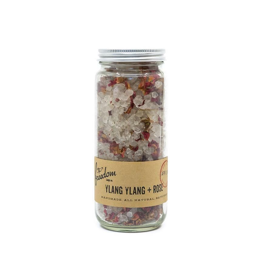 A jar of ylang ylang and rose bath salts
