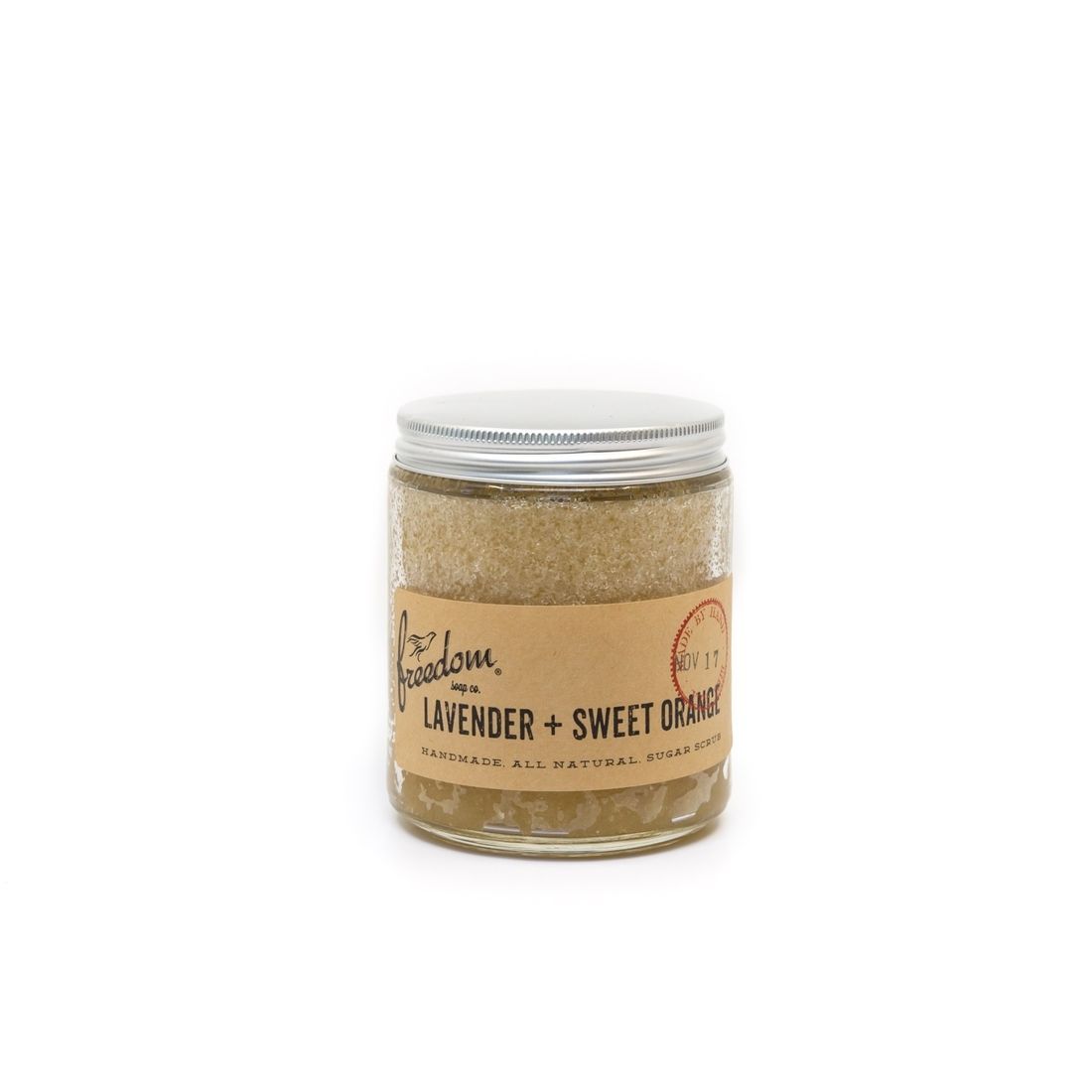 A jar of lavender and sweet oatmeal on a white background