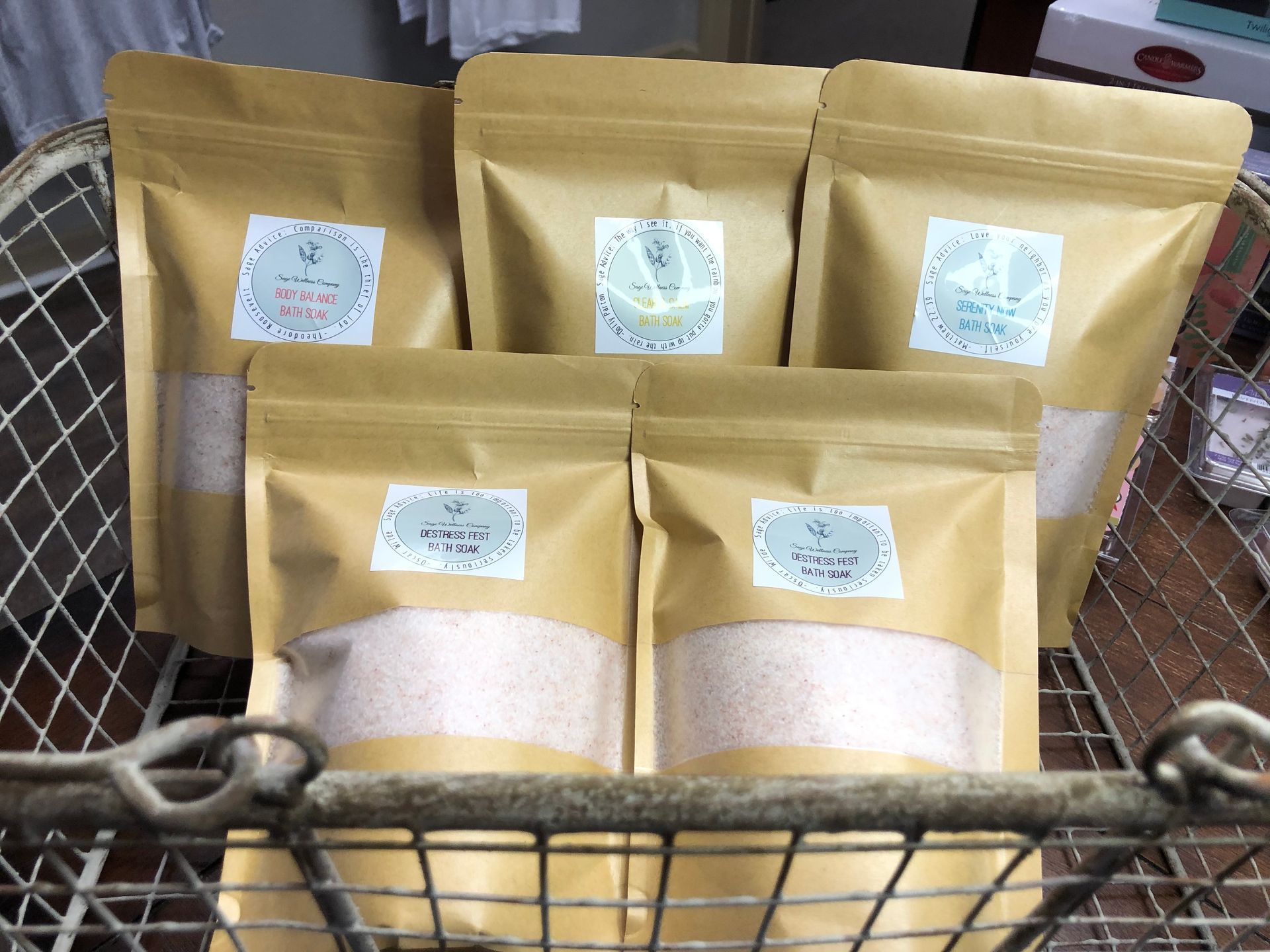 A basket filled with bags of powder is sitting on a table.