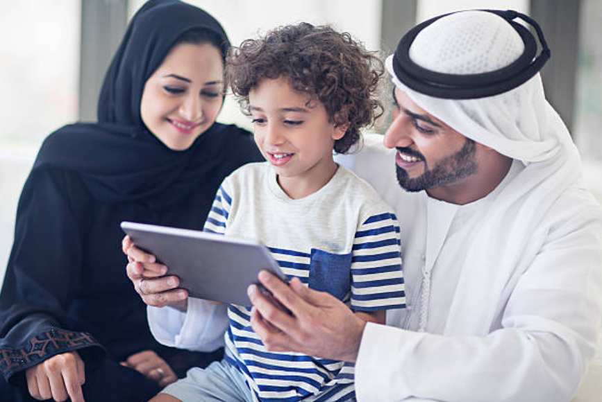 Family finding a new show to watch using entertainment metadata to improve discovery.