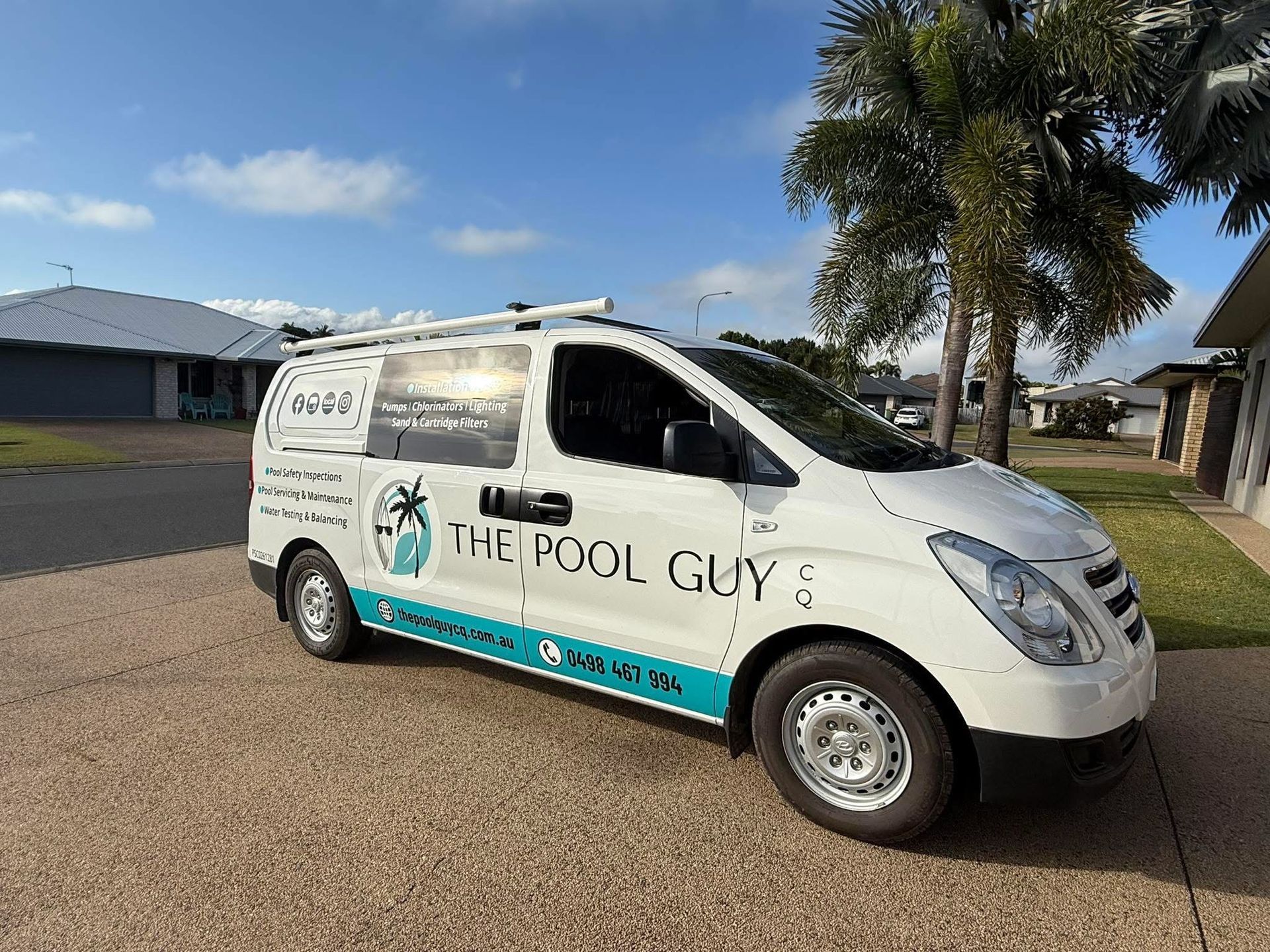 A Pool Cleaner is Being Used to Clean a Swimming Pool — Pool Maintenance in Pacific Heights, QLD
