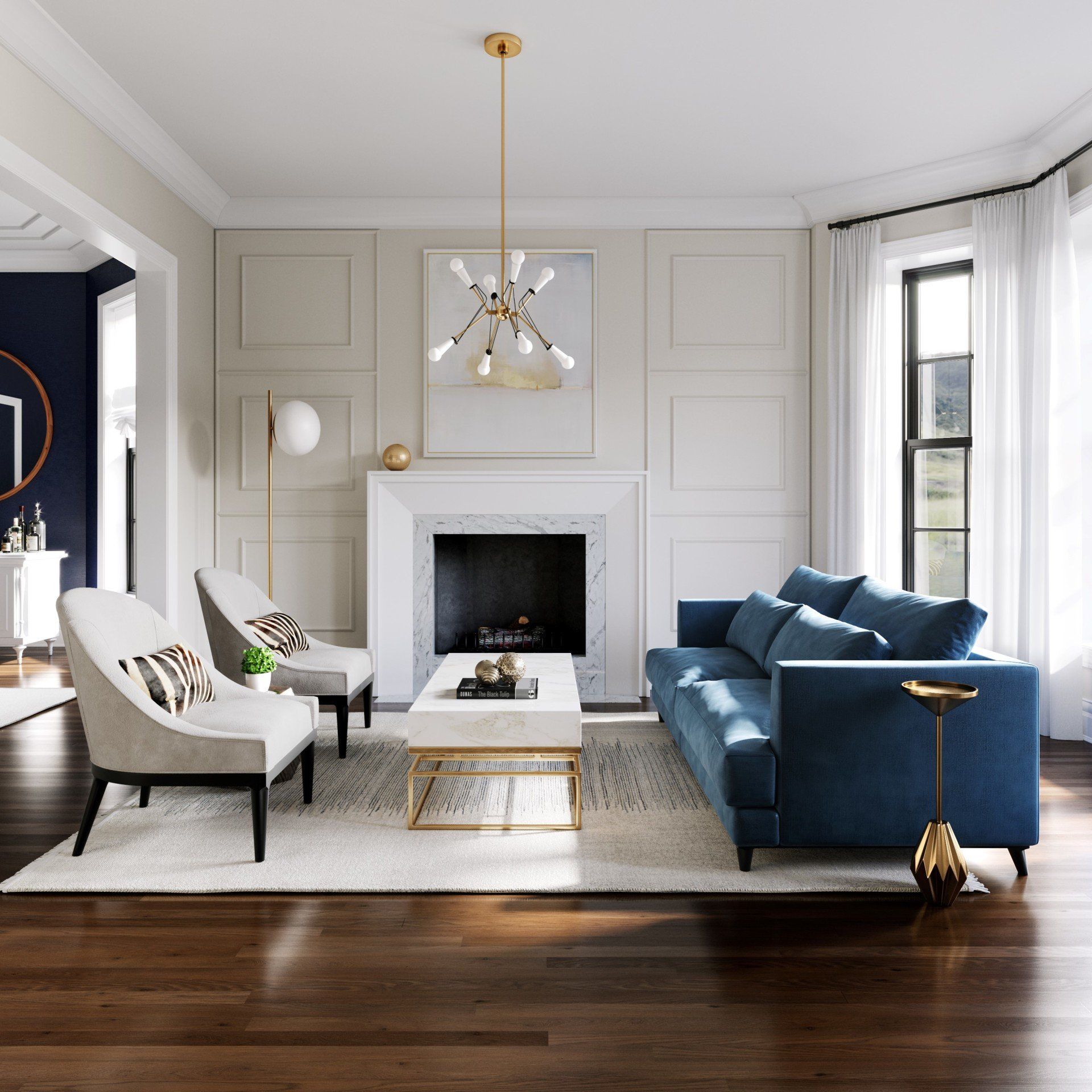 a living room with a blue couch and white chairs