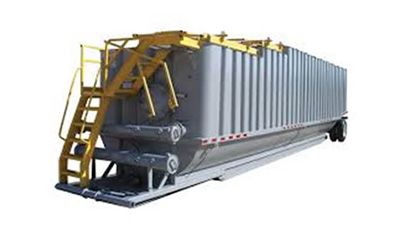 A large container with a ladder attached to it on a white background.