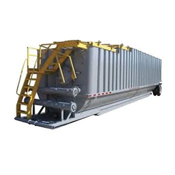 A large gray tank with a yellow ladder attached to it.