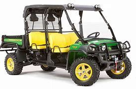 A green and yellow utility vehicle with yellow seats on a white background.