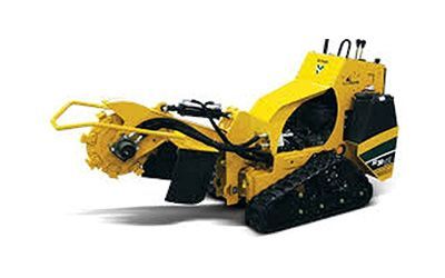 A yellow stump grinder is sitting on a white surface.