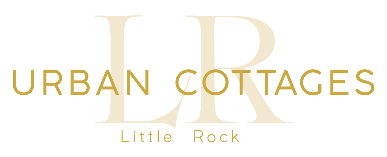 A logo for urban cottages little rock on a white background.
