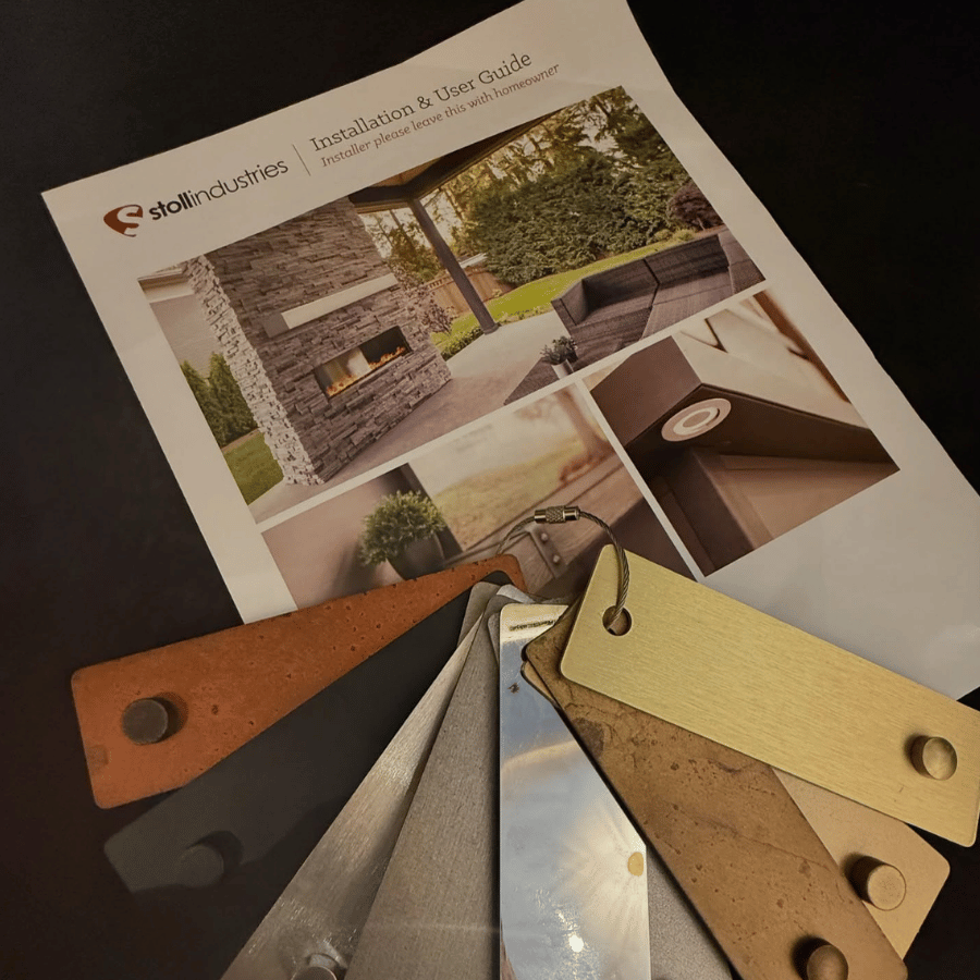 Sample brochure with outdoor patio photos and a fan of color/material swatches on a table