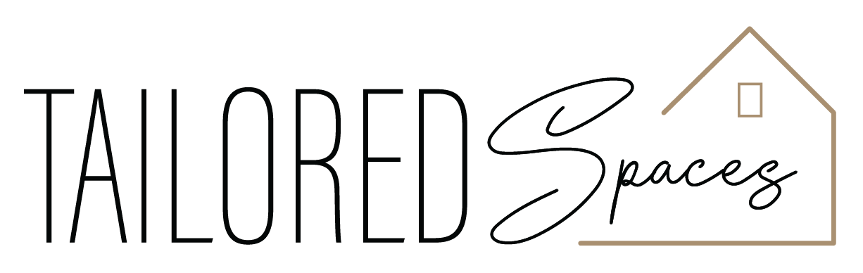 Tailed Spaces logo in black script with a tan house outline and small window icon