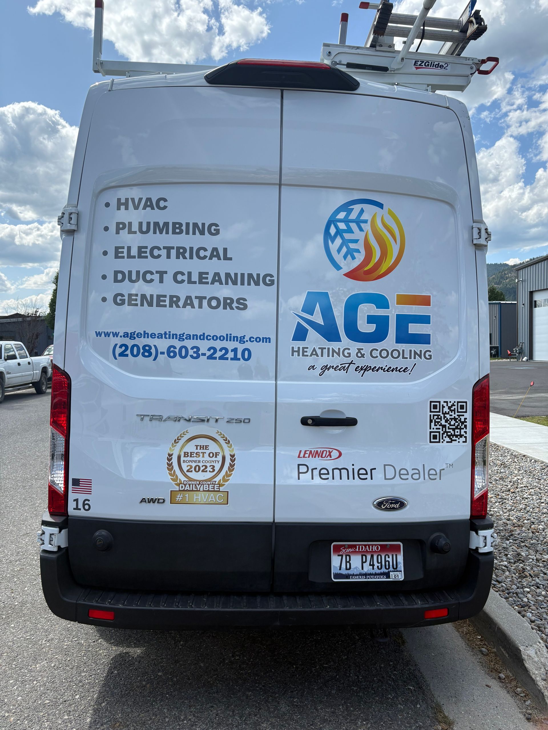 White van with AGE Heating & Cooling logo, services listed, and contact info.