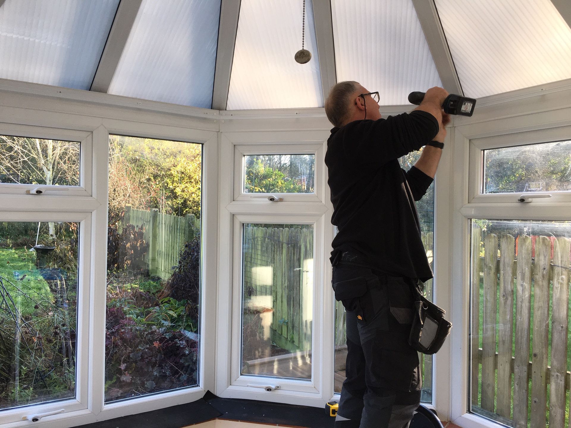 Supply and fitting curtain track in a conservatory