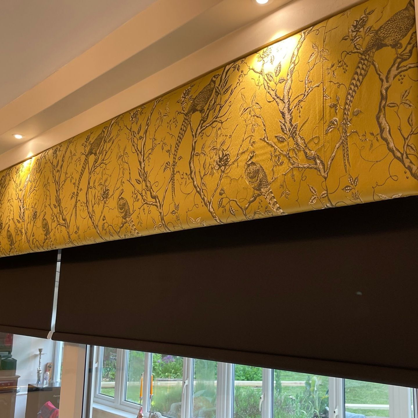 Window pelmet for a roller blind