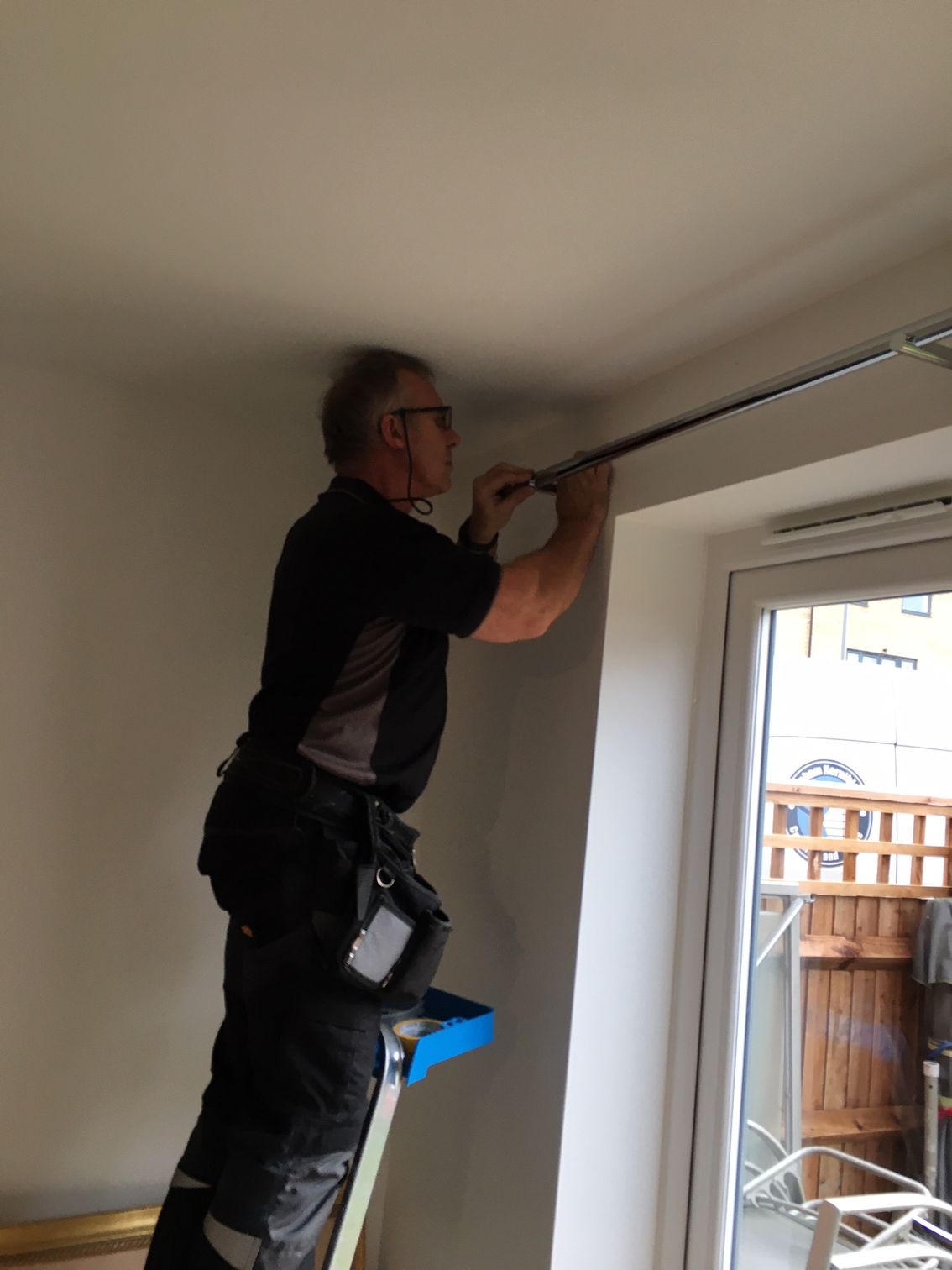 Curtain tracks and poles  supplied and fitted