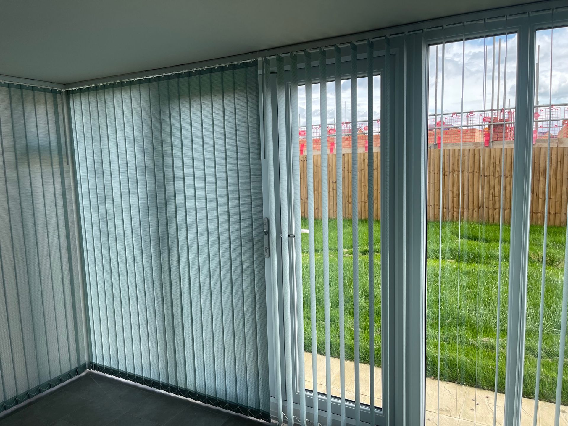 Vertical Blind for large bay windows and door allow easy access