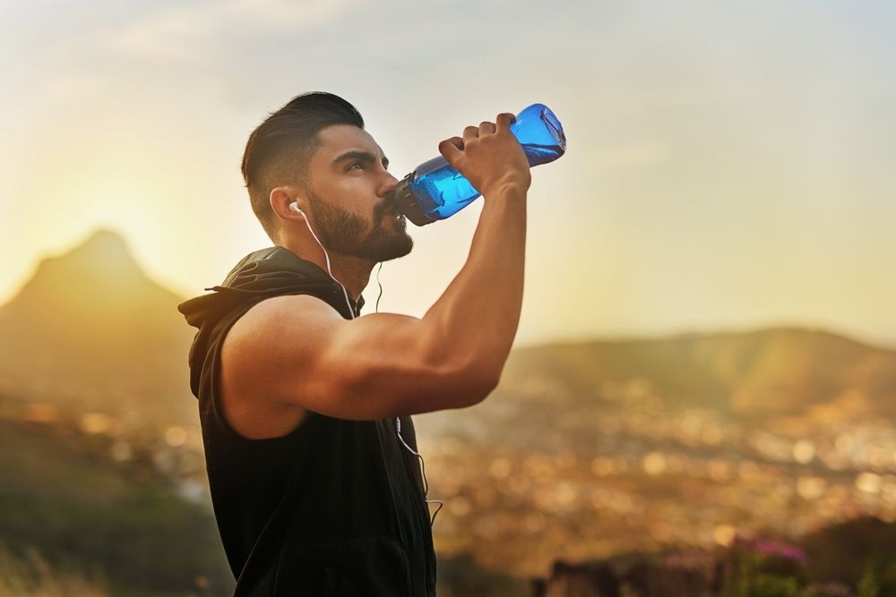 athlete drinking water