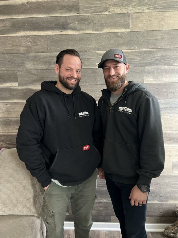 RS Installations founders standing next to each other.