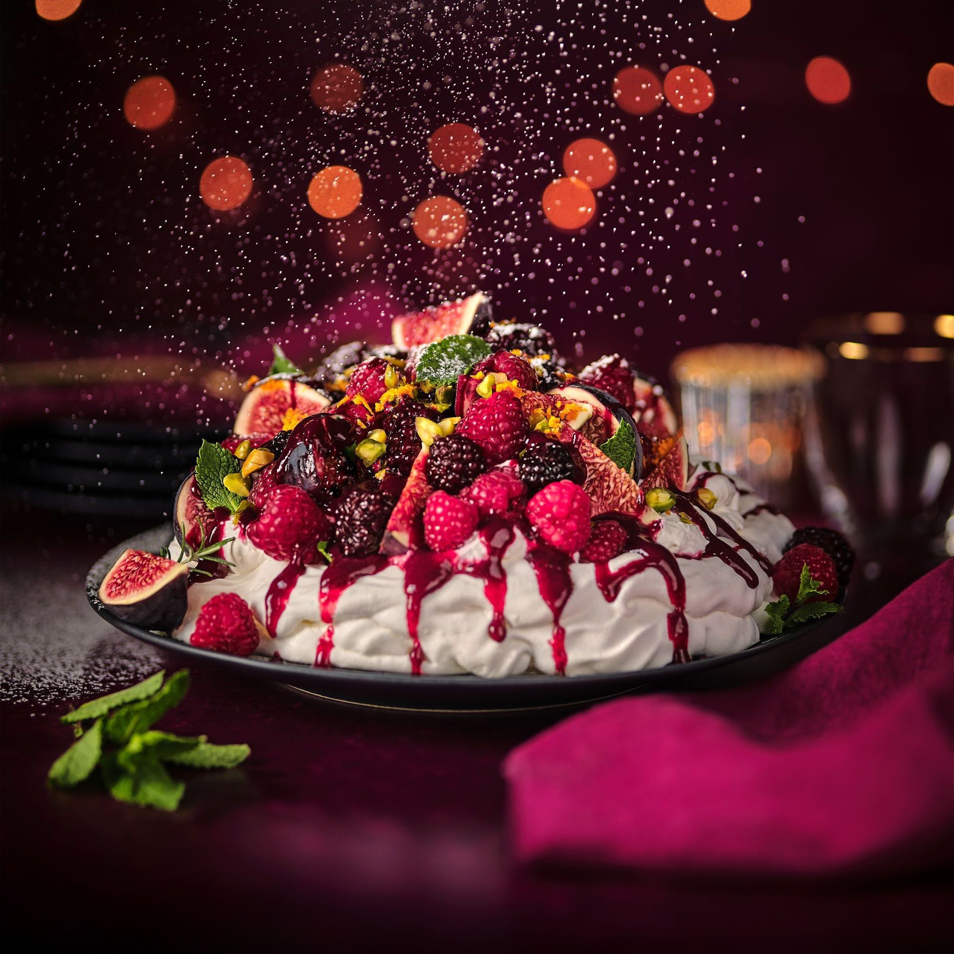 A plate of food with whipped cream and berries on it