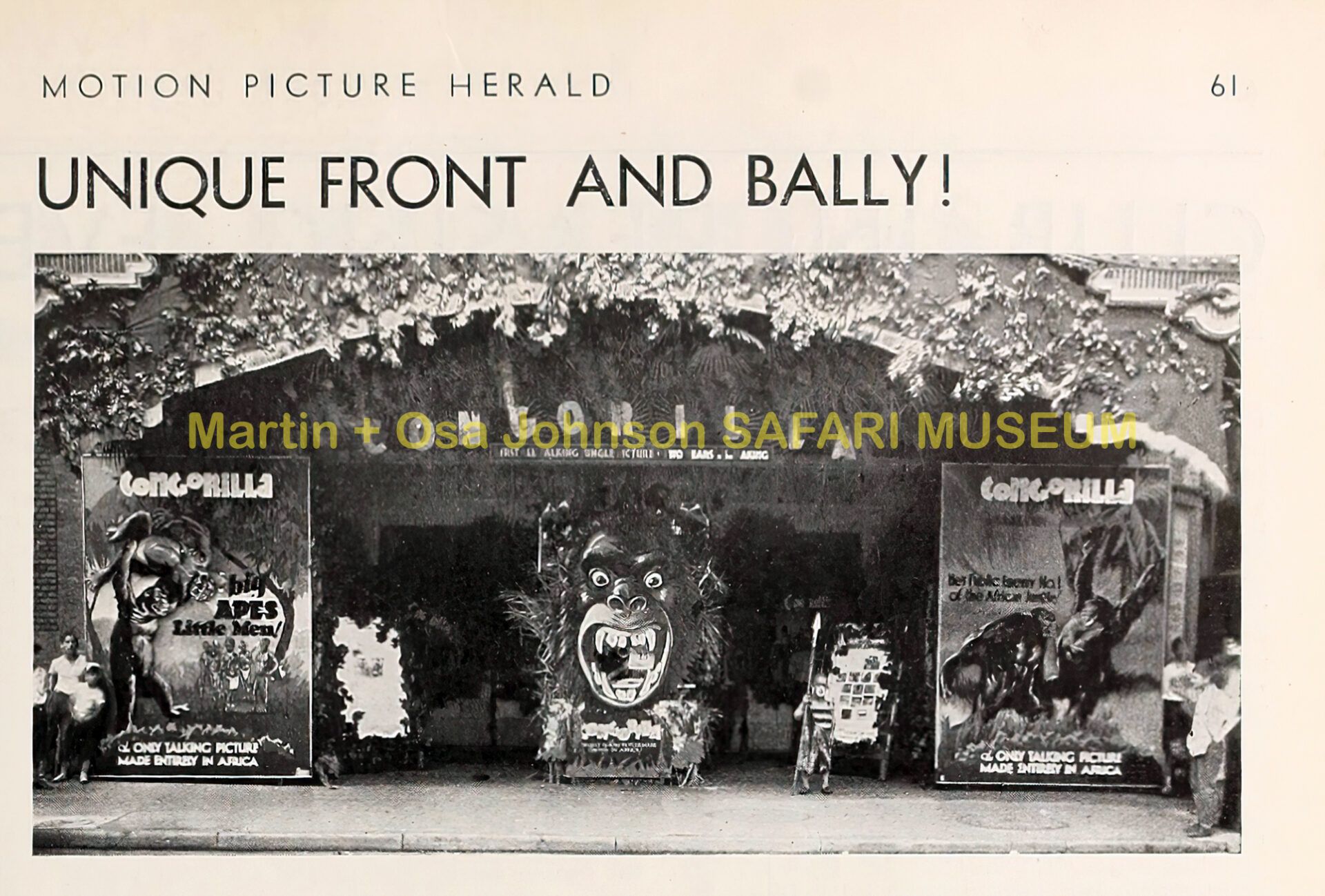 A theater entrance decorated with large Gorilla posters and a central gorilla display for a film screening.
