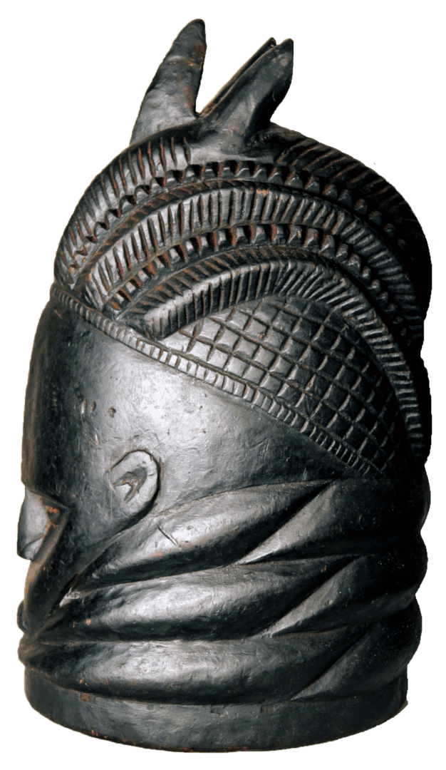 A dark, carved wooden Mende Sowei helmet mask with detailed hair patterns, horizontal neck ridges, and a small face.