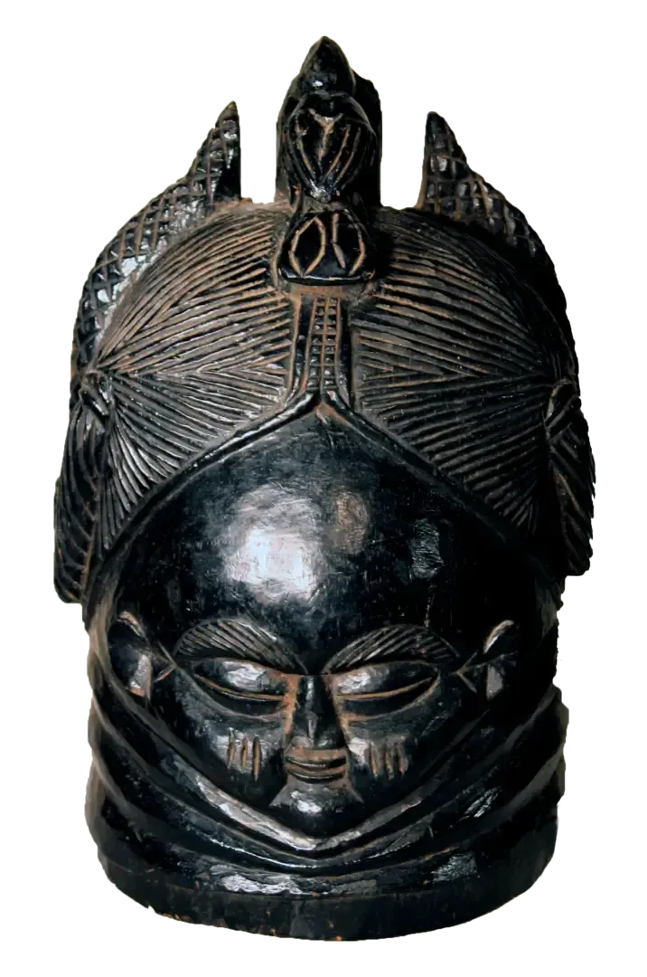 A polished black wood Mende Sande society helmet mask with intricate carved hair, closed eyes, and neck rings.