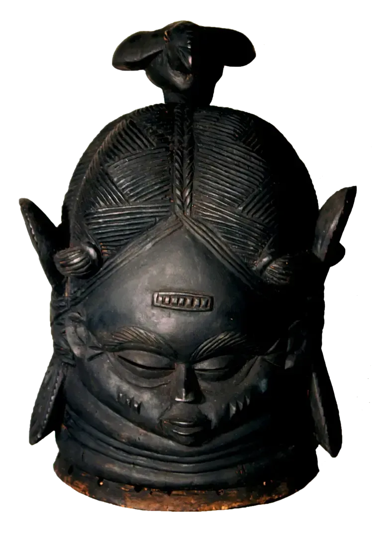 A carved, black wooden Mende Sande mask featuring intricate braided hair, a serene expression, and a bird-shaped finial.