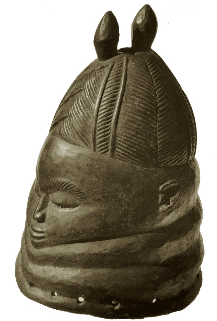 A dark, carved wooden helmet mask featuring stylized hair, layered neck rings, and small protrusions on the crown.