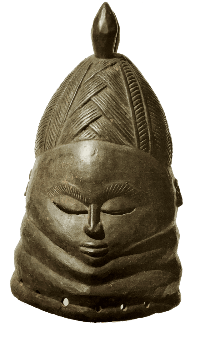 A carved wooden helmet mask featuring an intricate braided hairstyle, neck rolls, and downcast eyes.