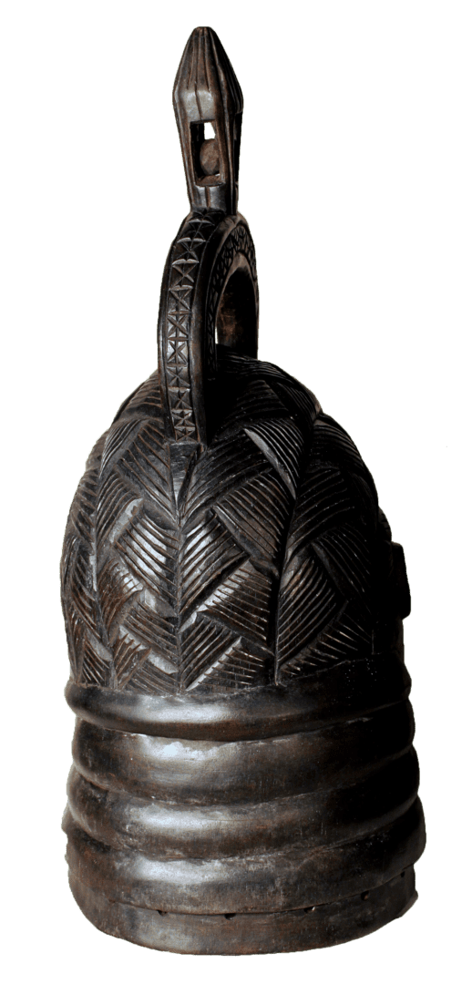 A dark, carved wooden bell featuring a textured herringbone pattern on the upper half and ribbed bands at the base.