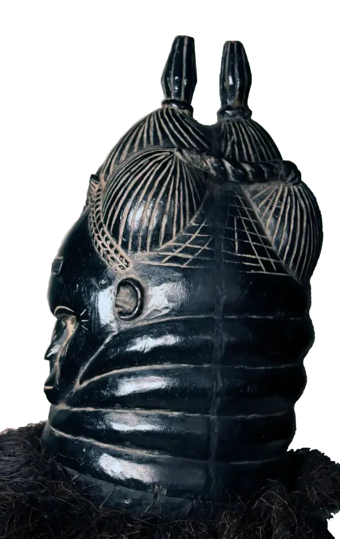 A polished black Mende Sowei mask with elaborate carved hair and neck rings, displayed against a white background.