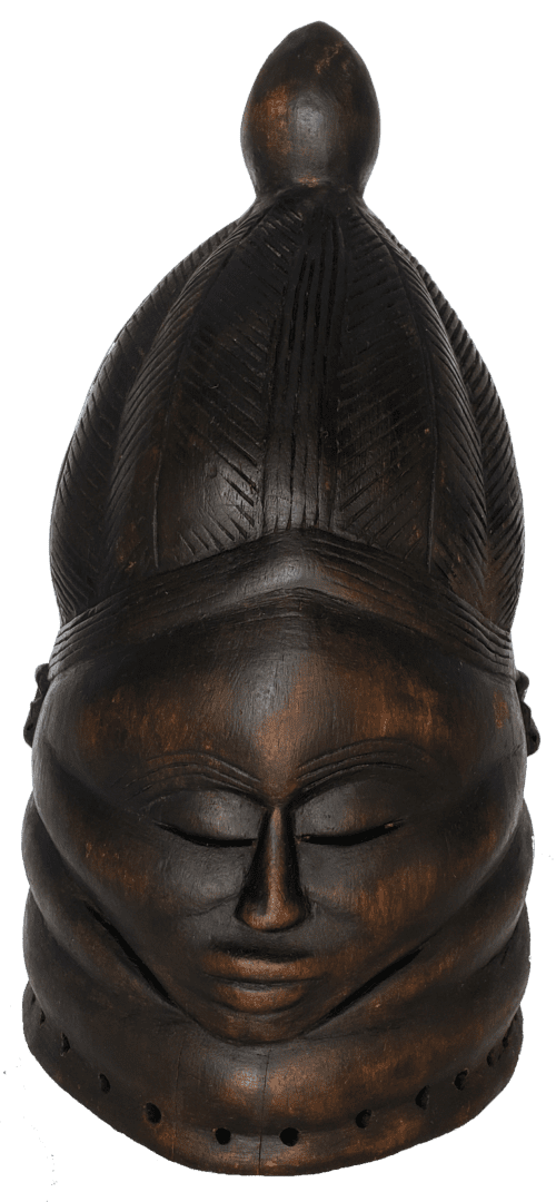 A dark, carved wooden helmet mask featuring an ornate, segmented hairstyle and serene facial features.