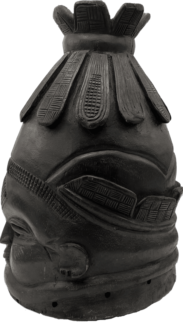 A dark, matte-black ceramic vessel sculpted into a stylized human face with an ornate, petal-like crown.