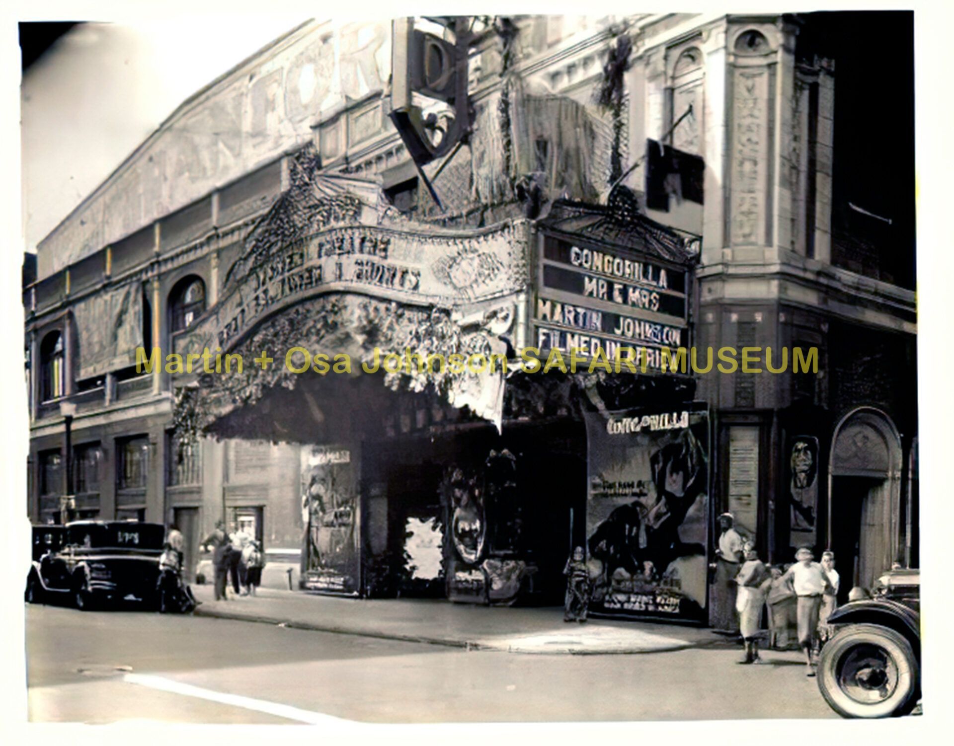 A black-and-white photo of a vintage theater marquee advertising the film