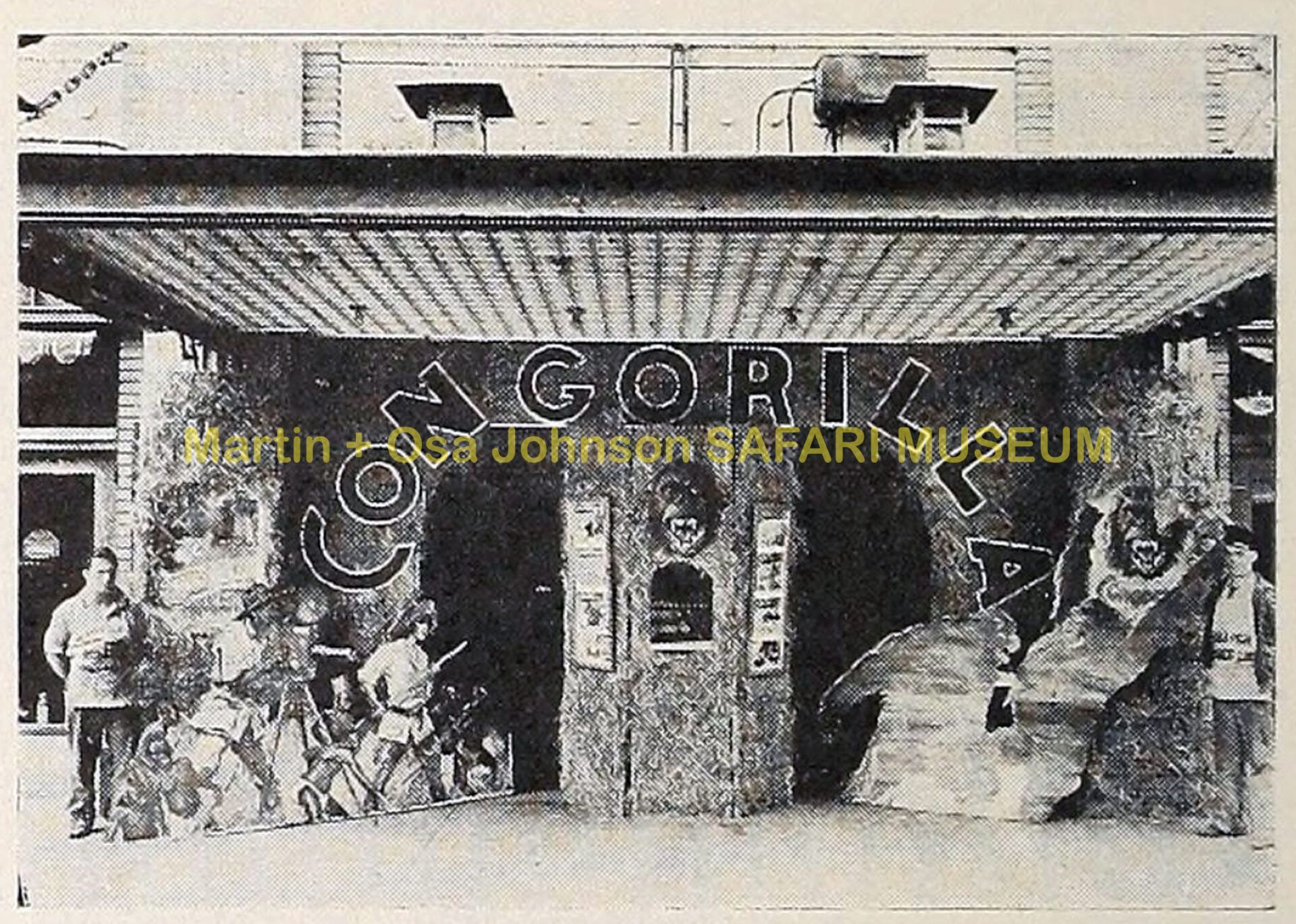 A theater entrance with large