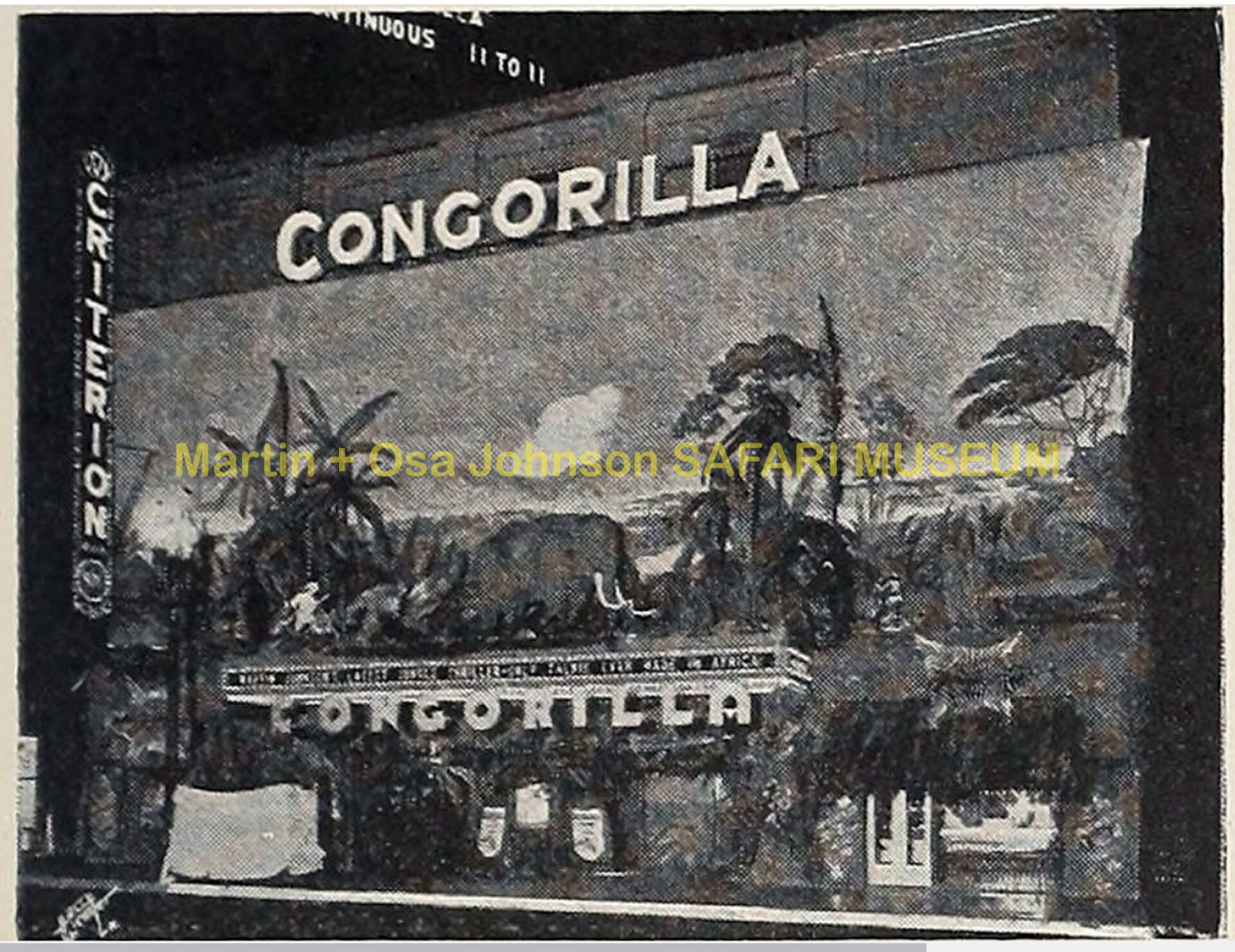 A historical, black-and-white photo of The Criterion theatre building showcasing a mural for the film,