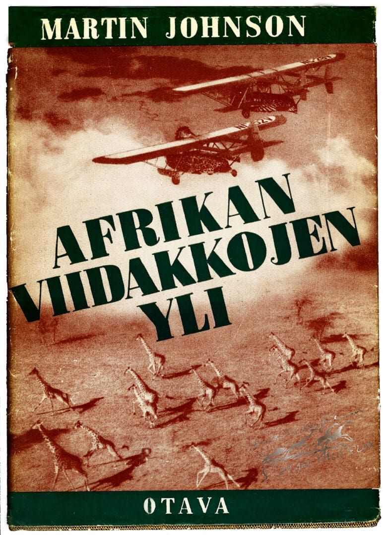 A sepia-toned book cover shows two airplanes flying over a savanna with a herd of giraffes below. Title: Afrikan Viidakkojen.