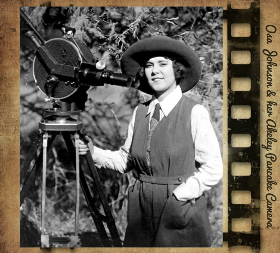 Osa Johnson stands next to a vintage Akeley Pancake motion picture camera on a tripod, framed by a film strip border.
