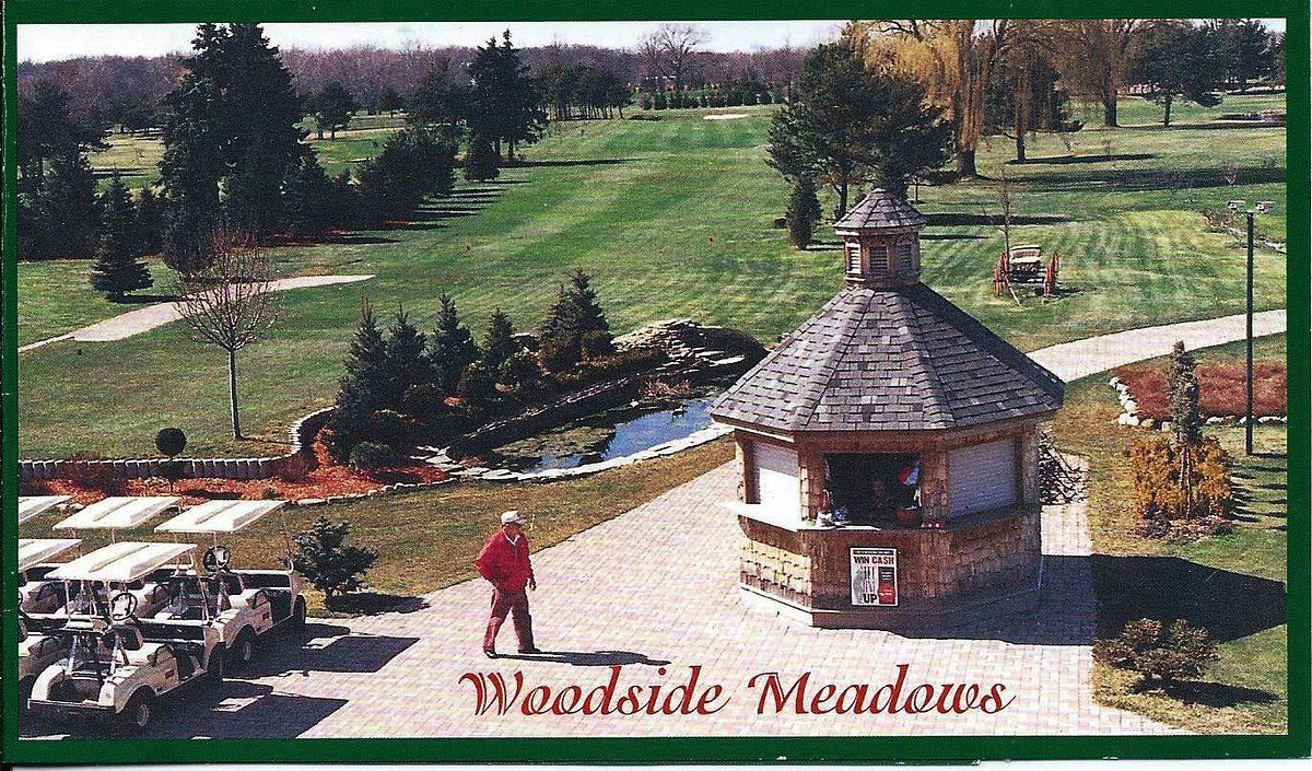 Woodside Meadows park with walking paths, a gazebo, and landscaped gardens