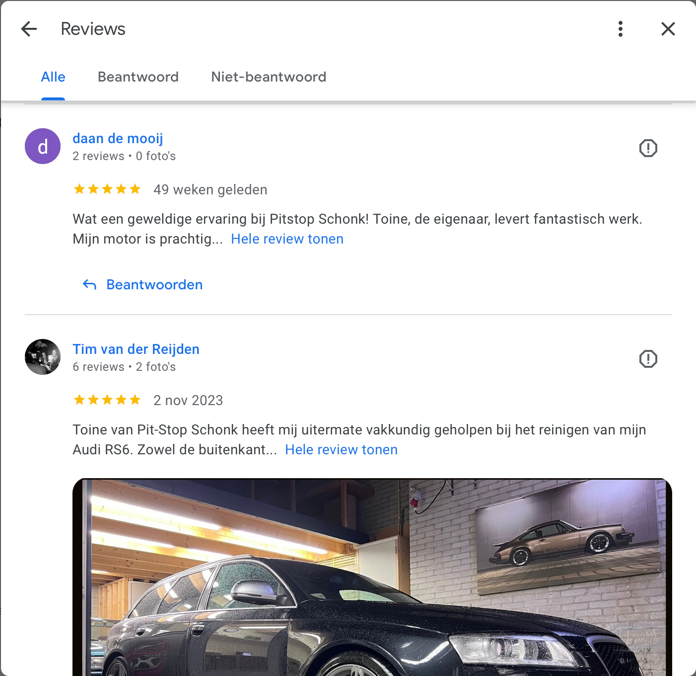 Een screenshot van een Google-recensiepagina met een foto van een auto.