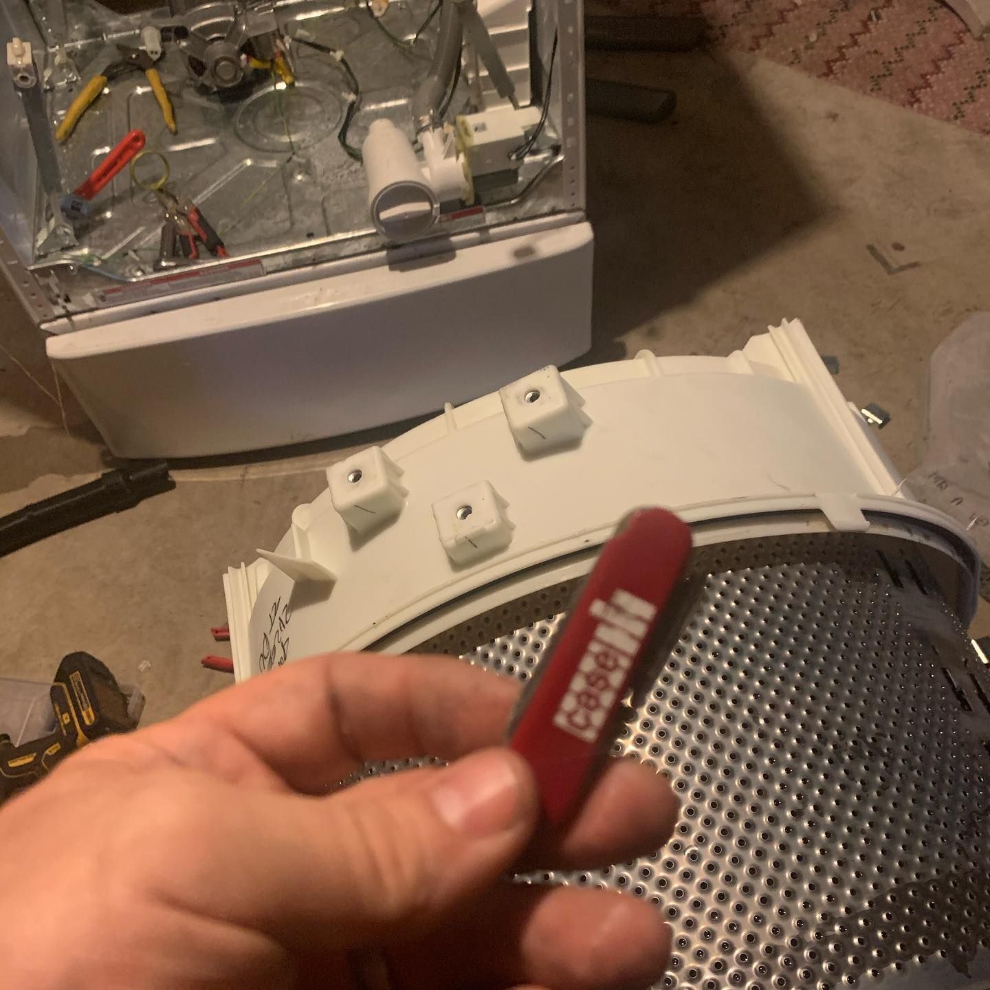 a person is holding a tool that says ' bosch ' on it