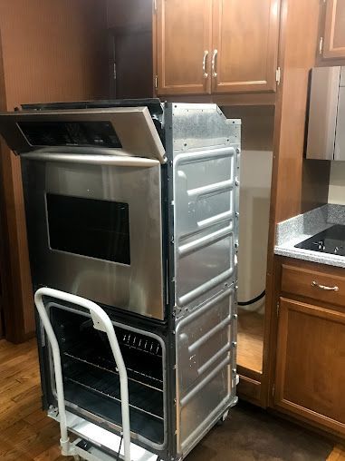 HVAC tech working in house
