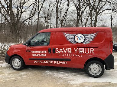 a red van with the words `` save your appliance '' written on it is parked in the snow .