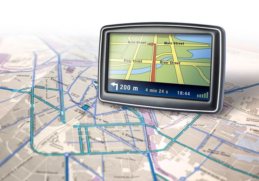 GPS device displaying a route on a detailed street map background.