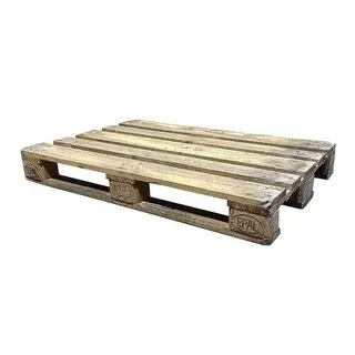 A wooden pallet is sitting on top of a white surface.